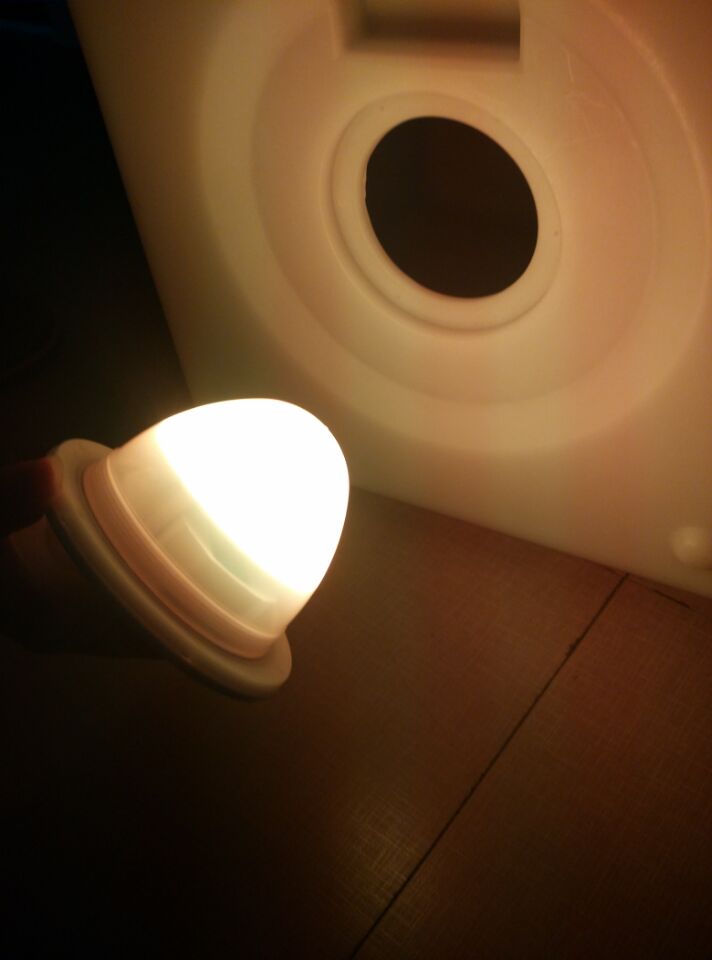 Illuminated VC-LN120 beside the bottom opening of a rotomolded PE stool